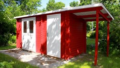 et færdigbygget skur af træ fra Sølund Huse