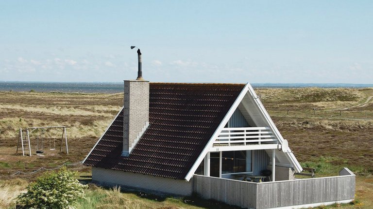 Dyk ned i sommerhusets historie